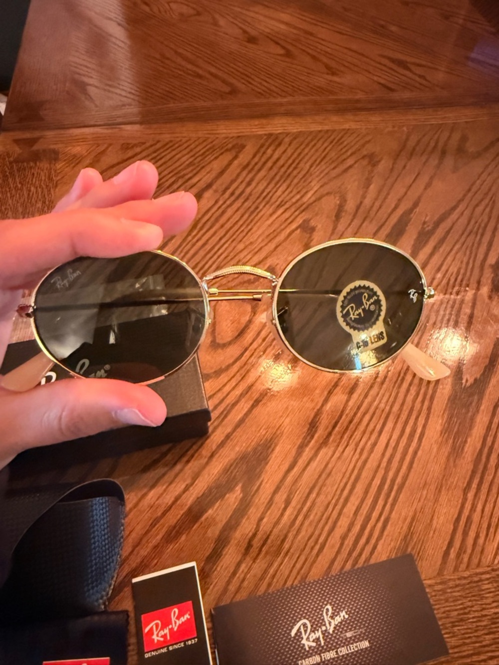 Ray-Ban Gold Frame Black Lens Round Sunglasses